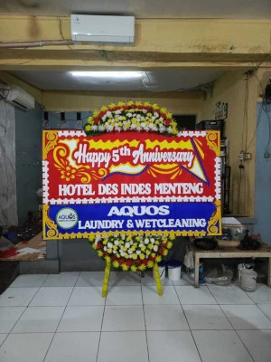 Papan Bunga di Menoro Sedan